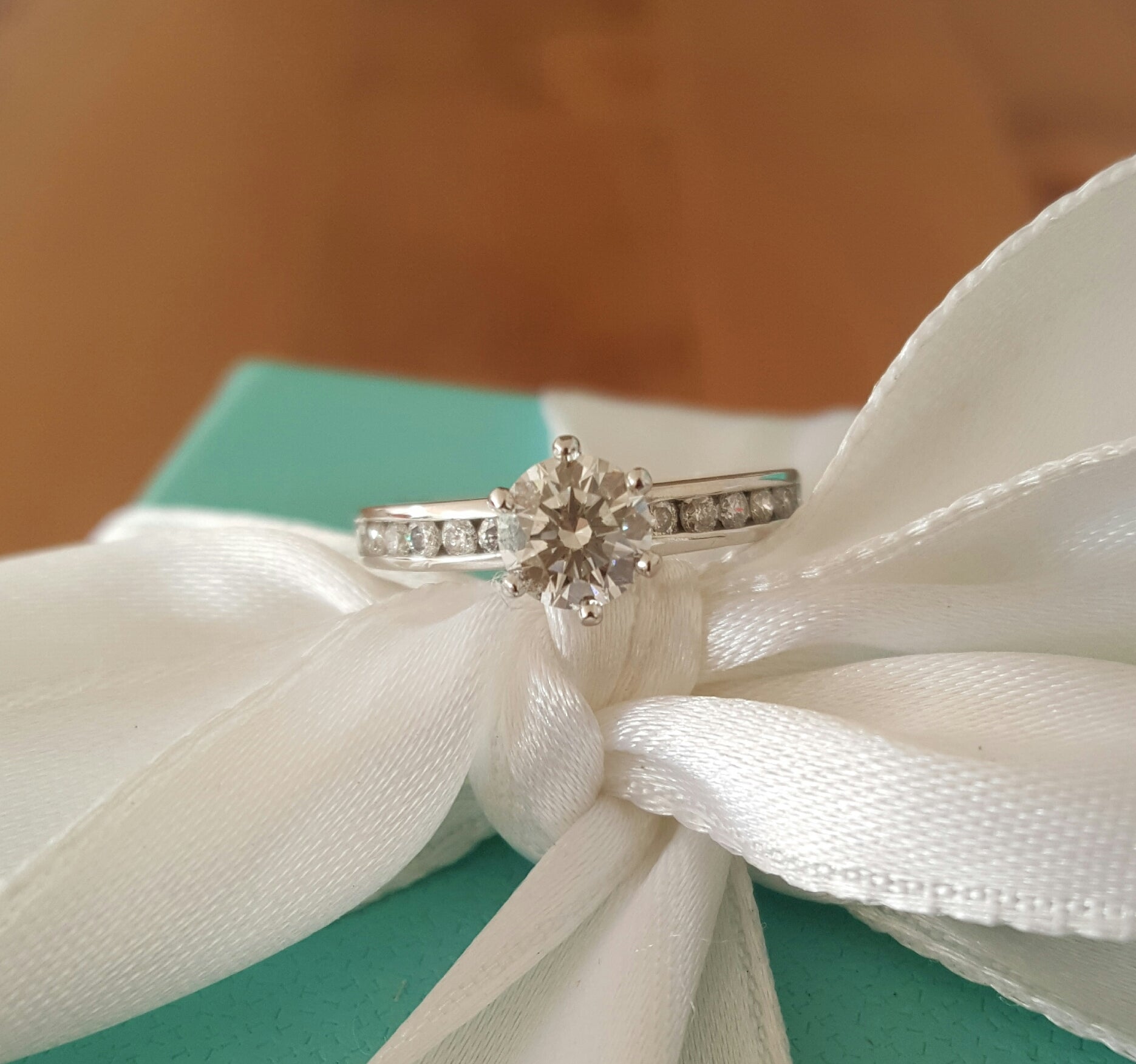 Tiffany & Co. 0.79tcw H/VVS2 Diamond Engagement Ring with Diamonds on the Band
