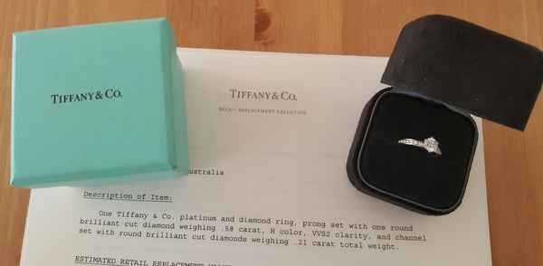Tiffany & Co. 0.79tcw H/VVS2 Diamond Engagement Ring with Diamonds on the Band