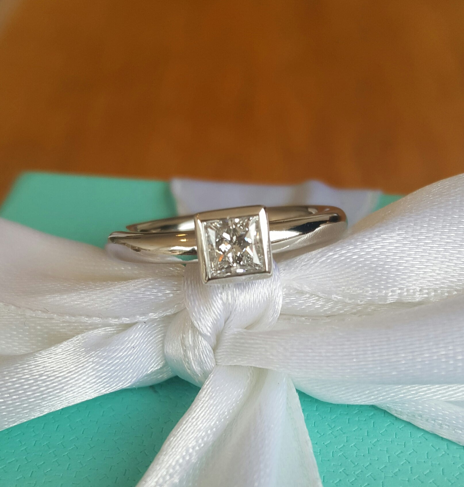 Tiffany & Co. 0.38 E/VVS2 Princess Cut Bezel Set Platinum Engagement Ring