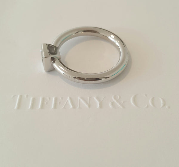 Tiffany & Co. 0.38 E/VVS2 Princess Cut Bezel Set Platinum Engagement Ring