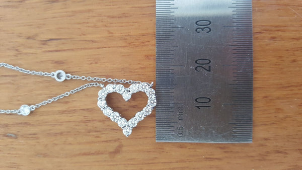 Vintage Tiffany & Co. Diamond Heart and DBTY Platinum Necklace.