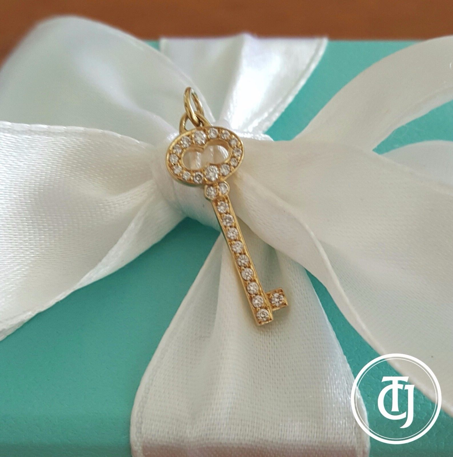 Vintage Tiffany Diamond Necklace. This is a key pendant is made of diamonds and yellow gold.  Cheaper than retail as the item is Pre-Loved.