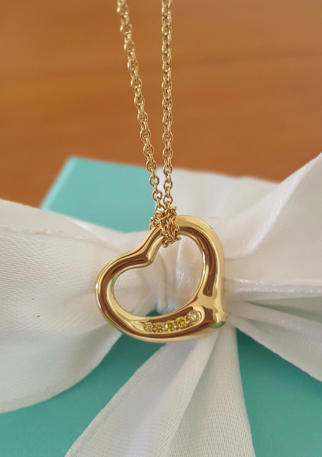 Tiffany Sterling Silver & Yellow Gold Bow Ribbon Heart Pendant