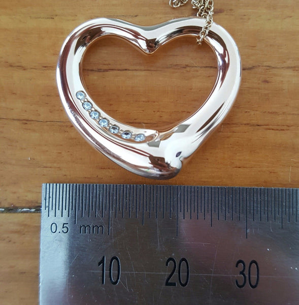 Vintage Tiffany & Co. Diamond Heart Pendant in 18ct Rose Gold. This Pre-Loved Necklace is Cheaper than Retail. Save Significantly. 