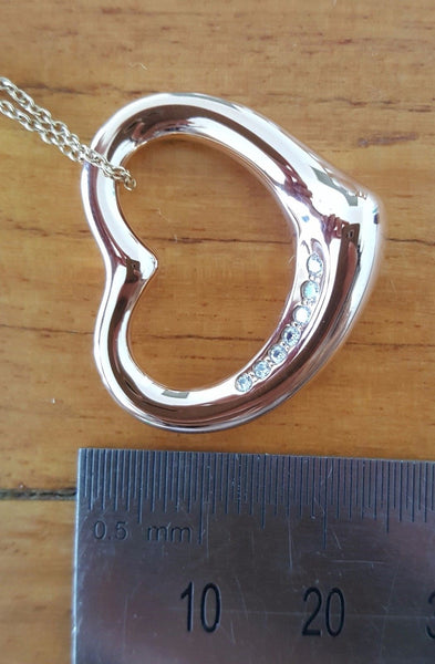 Vintage Tiffany & Co. Diamond Heart Pendant in 18ct Rose Gold. This Pre-Loved Necklace is Cheaper than Retail. Save Significantly. 