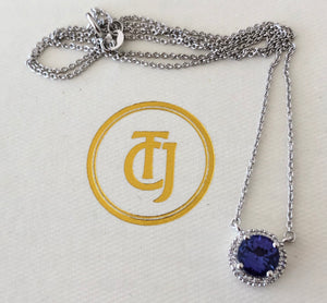 0.90ct Tanzanite and 0.06tcw Diamond Pendant in 14ct White Gold