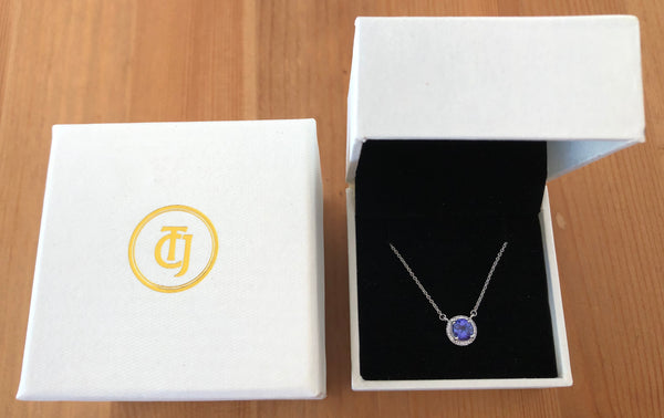 0.90ct Tanzanite and 0.06tcw Diamond Pendant in 14ct White Gold