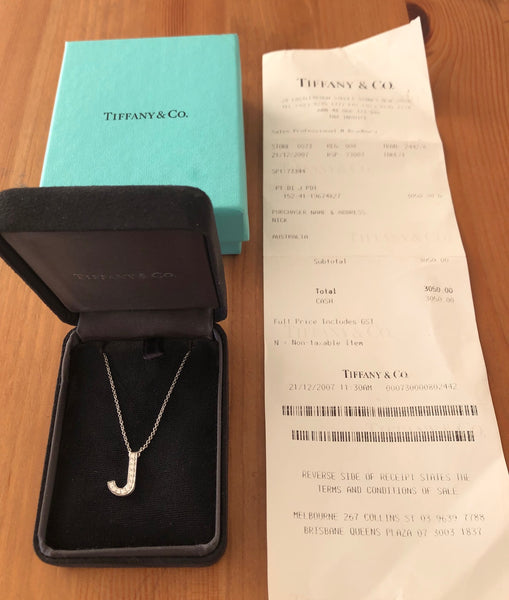 Tiffany & Co. 0.11tcw Diamond and Platinum 'J' Alphabet Necklace Receipt and Box