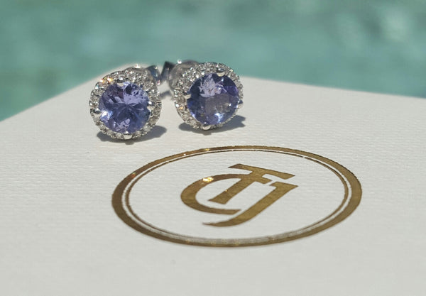 0.80tcw Tanzanite and 0.10tcw Diamond Halo 'Embrace' Earrings in 18ct White Gold by CTJ